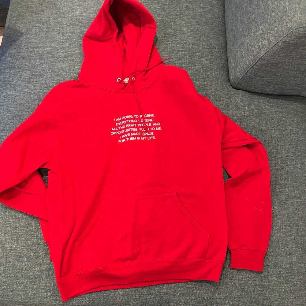 We’re Not Really Strangers Red Manifestation Hoodie